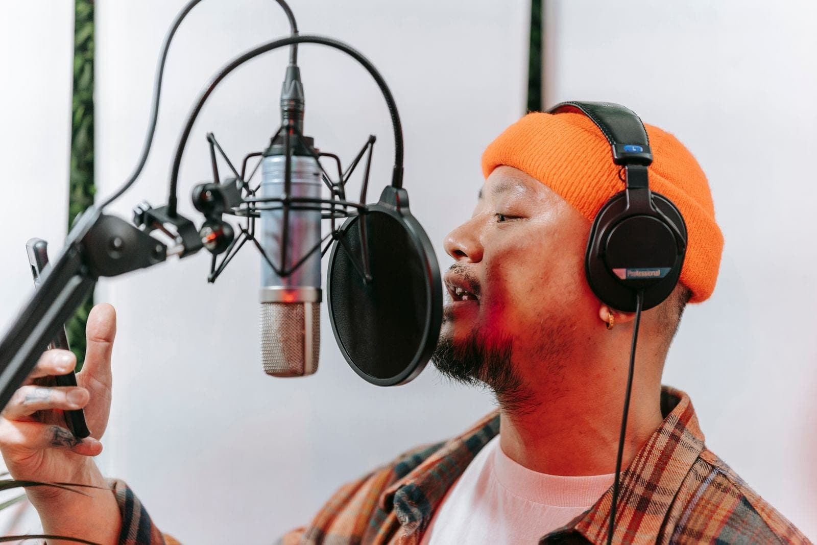 A Man using Condenser Microphone