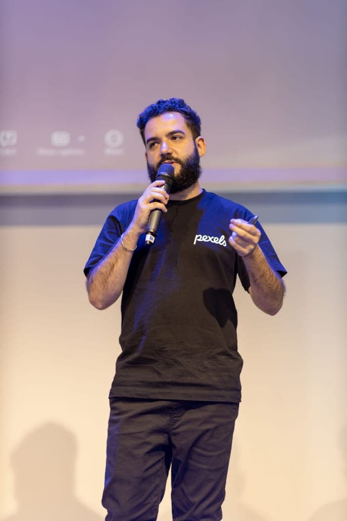 Public Speaker Delivering a Presentation on Stage